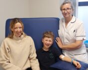 Dawson Fluck, his mum Chelsea and Phlebotomy Deputy Manager, Alexis Butler